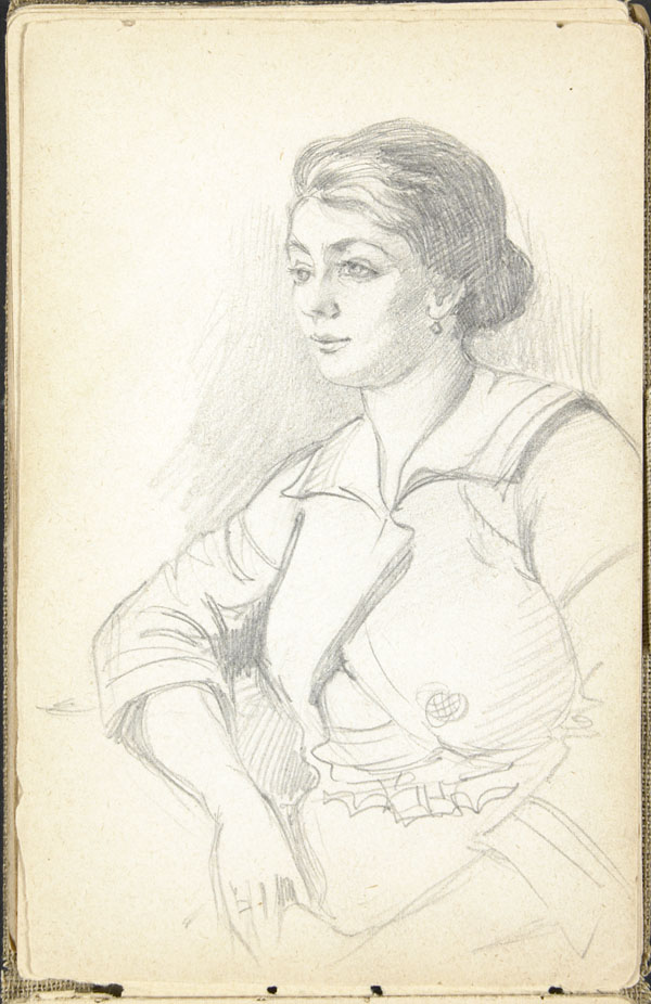 Portrait d'une femme portant des boucles d'oreilles et une veste écourtée